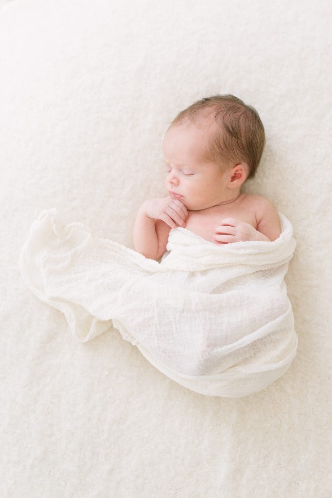 katie ballantine photography white swaddled newborn minimalist newborn image all natural photography frederick maryland newborn photographer