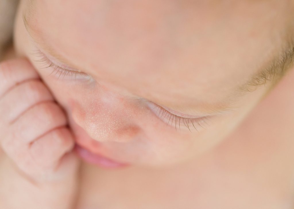 katie ballantine photography white swaddled newborn minimalist newborn image all natural photography macro newborn eyelash details.  new market maryland baby photographer frederick maryland newborn photographer