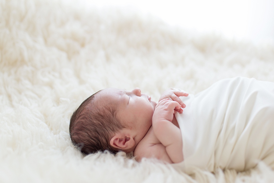 Katie Ballantine Photography Frederick Newborn Photography. New Market Baby Photographer.  on white blanket. All white studio
