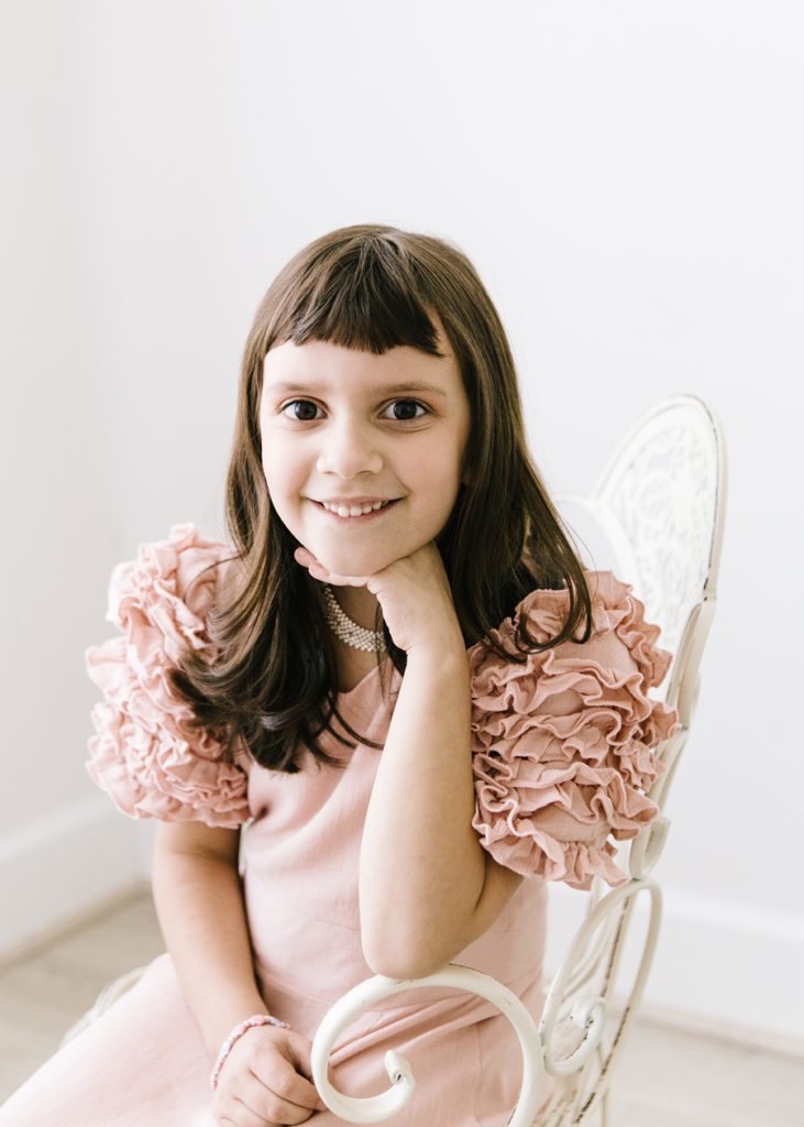 Katie Ballantine Photography.  Frederick Maryland Child Photographer.  New Market, Maryland Studio Child Photographer.  Girl in pink dress 