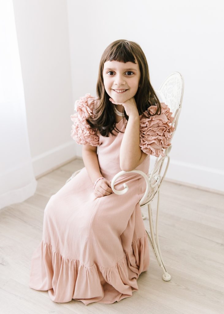 Katie Ballantine Photography.  Frederick Maryland Child Photographer.  New Market, Maryland Studio Child Photographer.  Girl in pink dress 