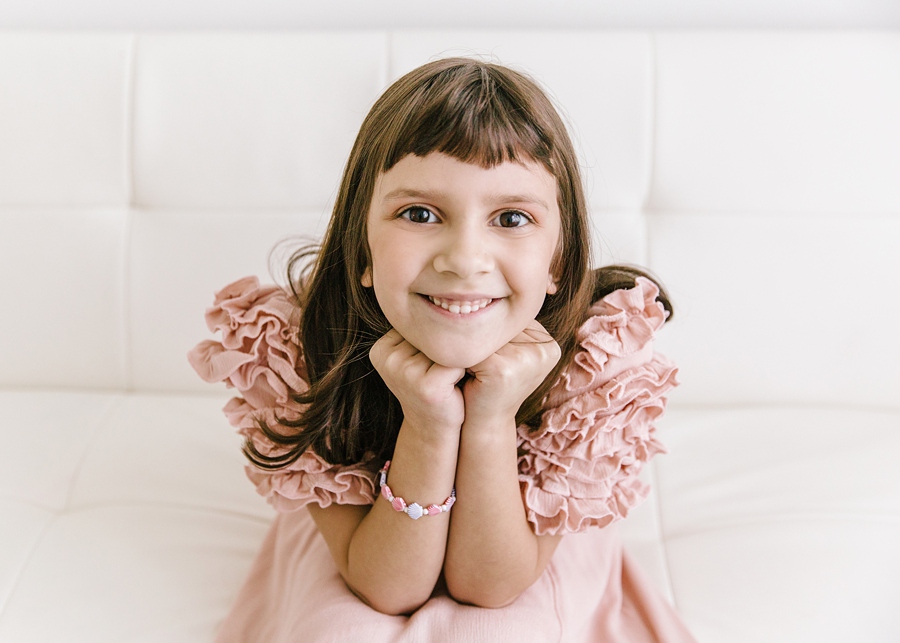 Katie Ballantine Photography.  Frederick Maryland Child Photographer.  New Market, Maryland Studio Child Photographer.  Girl in pink dress 