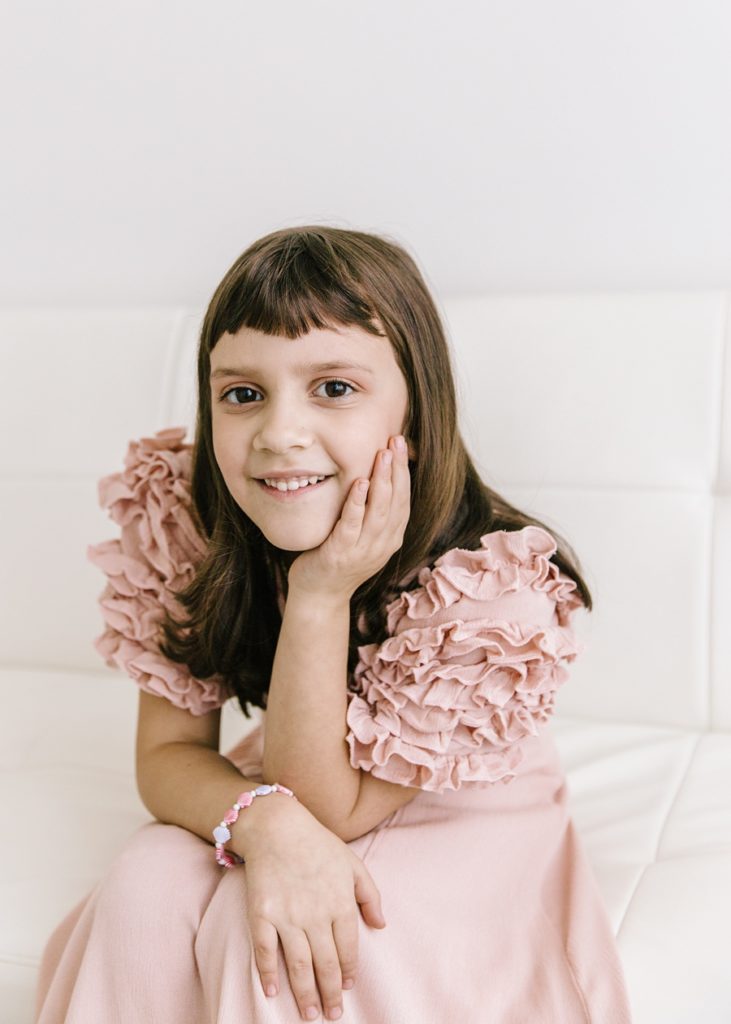 Katie Ballantine Photography.  Frederick Maryland Child Photographer.  New Market, Maryland Studio Child Photographer.  Girl in pink dress 