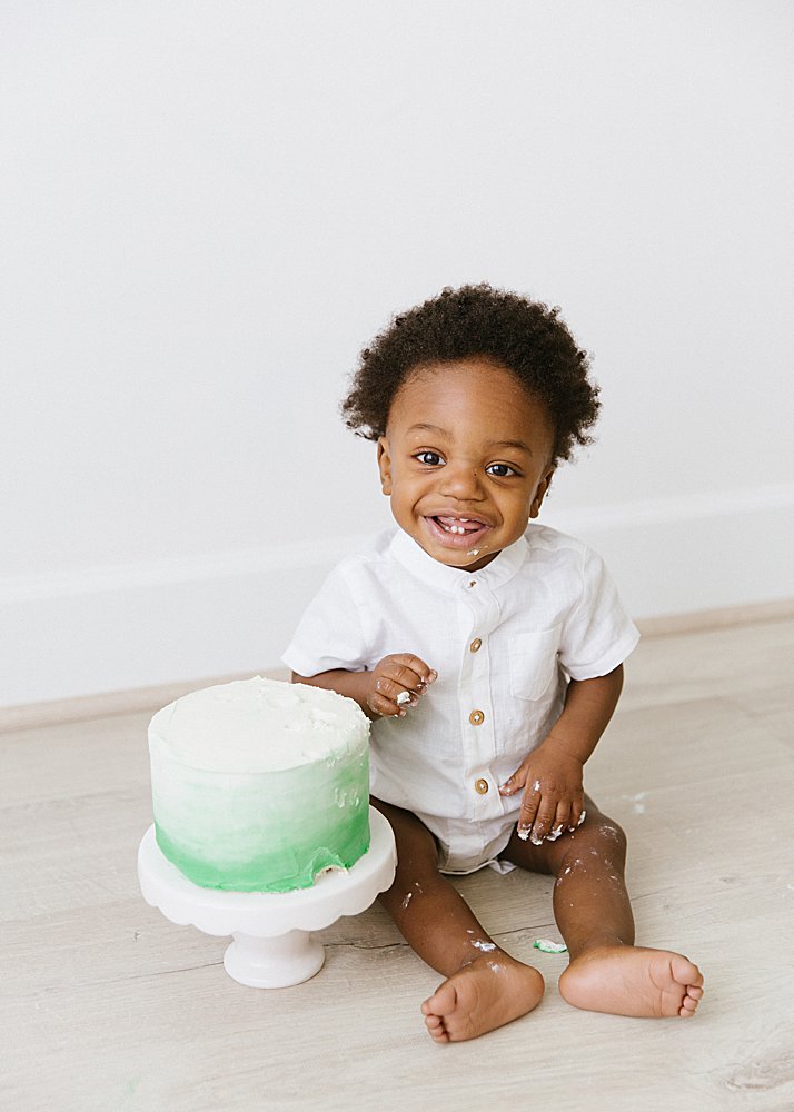 Katie Ballantine Photography.  New Market Maryland Baby Photographer.  Frederick Maryland Child Photographer.  First birthday cake smash portraits.  