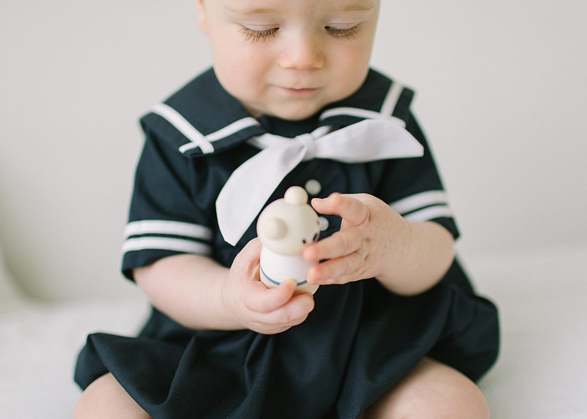 Katie Ballantine Photography. New Market Baby and child Photographer. Organic baby photography Frederick Maryland. Frederick Maryland child studio portraits. Baby sailor outfits. 6 month old sitting up session.