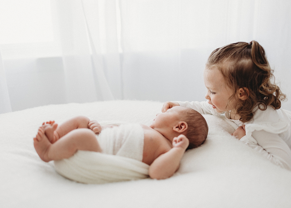 Katie Ballantine Photography. Frederick newborn photographer. New Market baby and newborn photographer. all white studio frederick maryland