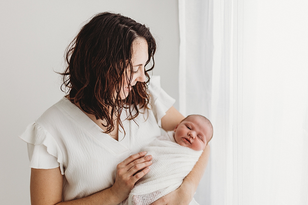 Katie Ballantine Photography. Frederick newborn photographer. New Market baby and newborn photographer. all white studio frederick maryland