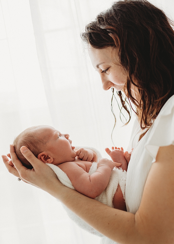 Katie Ballantine Photography. Frederick newborn photographer. New Market baby and newborn photographer. all white studio frederick maryland