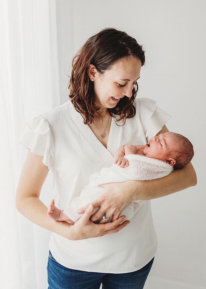 Katie Ballantine Photography. Frederick newborn photographer. New Market baby and newborn photographer. all white studio frederick maryland